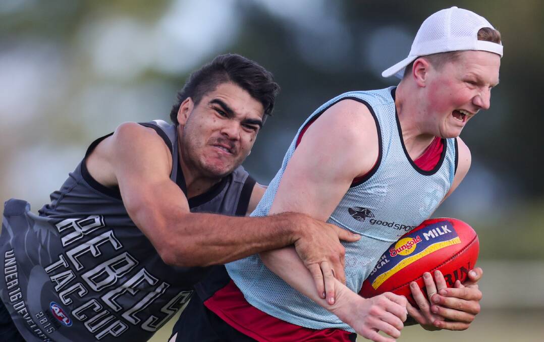 NO HOLDING BACK: Phil Chatfield tackles Zac Timms during pre season training. Picture: Morgan Hancock