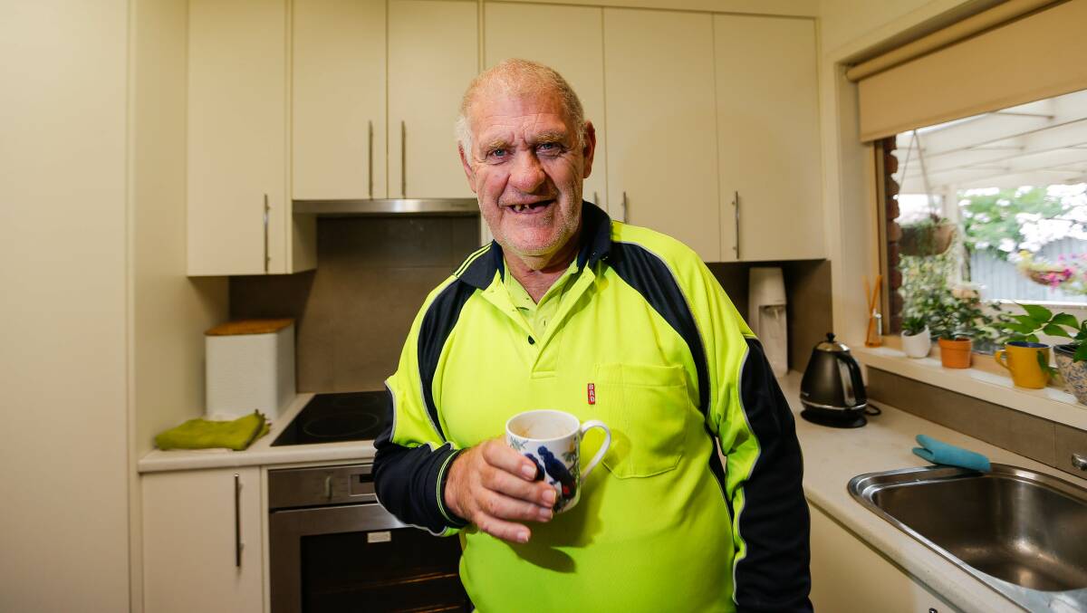 HAPPY: Neville O'Donohue lives at Scope's supported independent living facility in Warrnambool. Picture: Anthony Brady

