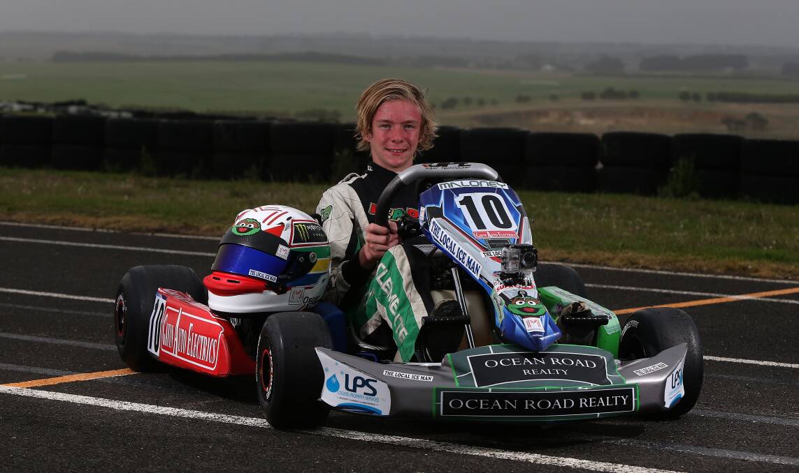 In the driver's seat: Oscar Maloney, 13, is going to be on the grid at the start of the Formula One Australian Grand Prix. Picture: Mark Witte