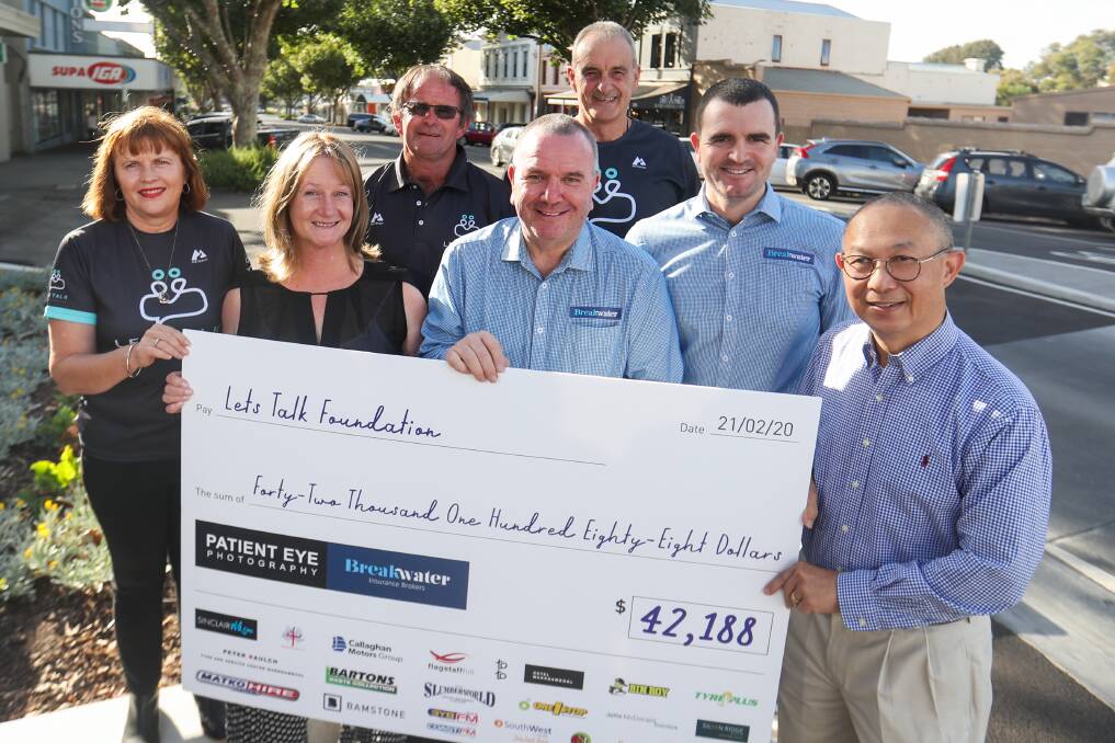 More funds to talk: Jane Fitzgibbon, Claire Brown, Michael Fitzgibbon, Jeff Dennis, John Parkinson, Michael Dennis and Perry Cho with the cheque presented to Let's Talk. Picture: Morgan Hancock