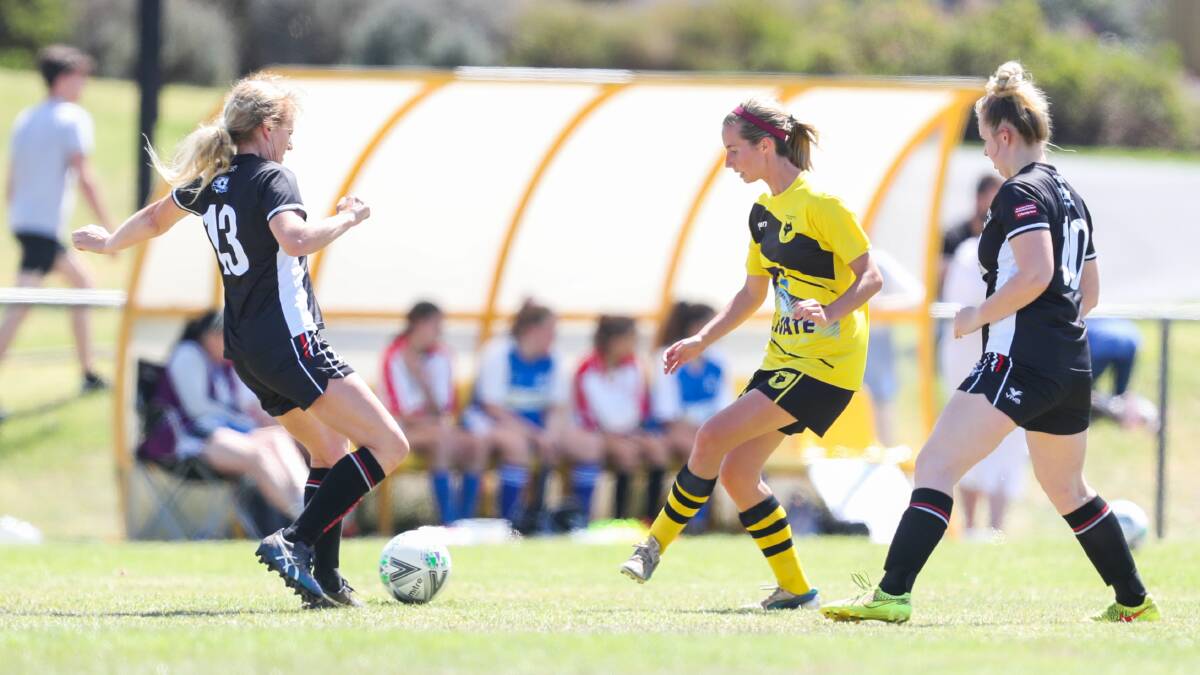 ON HOLD: Warrnambool Wolves' Amanda Gaffey-Smyth passes the ball. Grassroots soccer has been suspended until April 14. Picture: Morgan Hancock