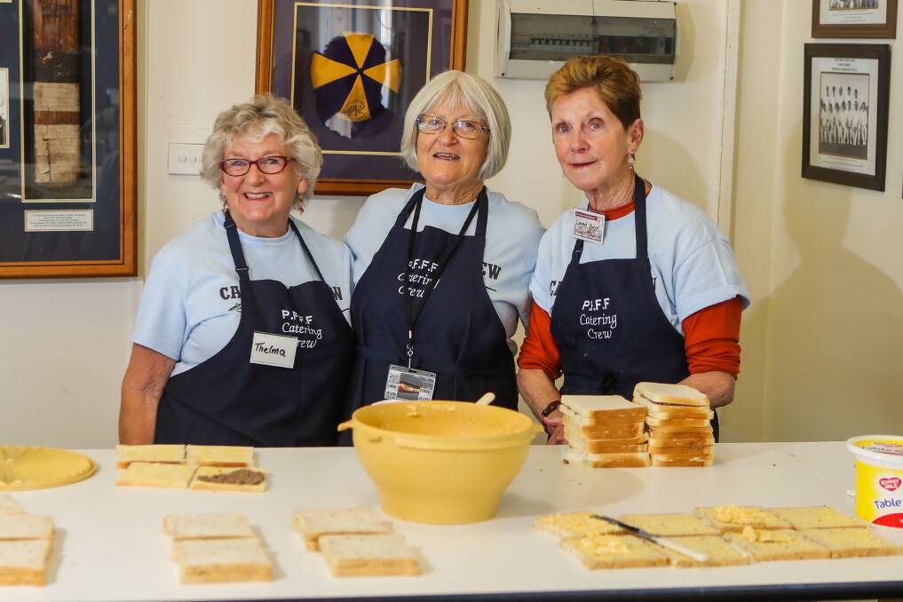 Catering: Volunteer caterers Thelma Swifte, Lyn Brown and Carmel Dwyer have been feeding hundreds of volunteers who are setting up the Port Fairy Folk Festival. Picture: Morgan Hancock