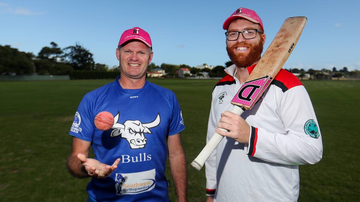 TEAMING UP: Brierly-Christ Church division two captain Anthony Love and Koroit counterpart Matt Webster show off some pink the two sides will don on Saturday. Picture: Morgan Hancock