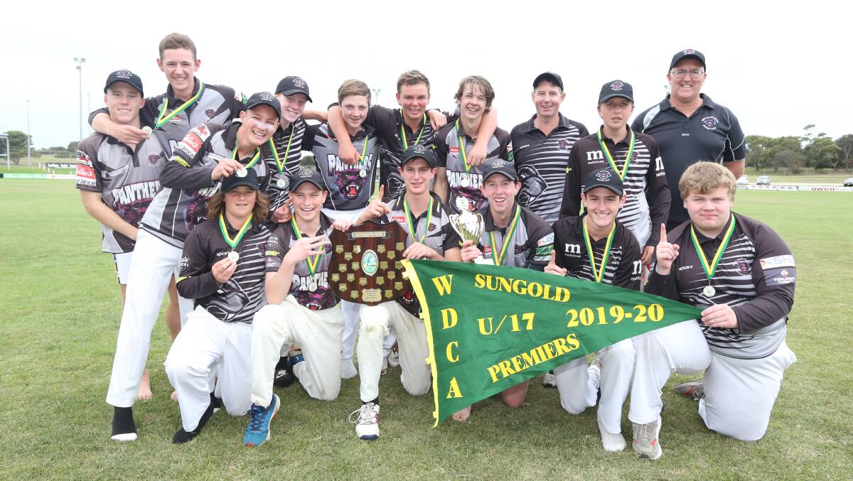 PROUD DAY: West Warrnambool players celebrate winning the under 17 grand final at Reid Oval on Sunday. Picture: Mark Witte
