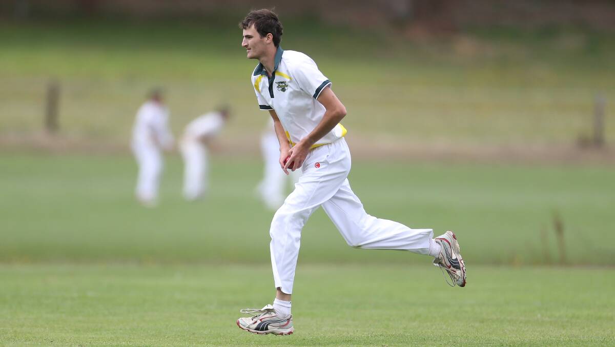 STEAMING IN: Camperdown's Henry Moyle runs into bowl. He took 1-24 in the win. Picture: Mark Witte
