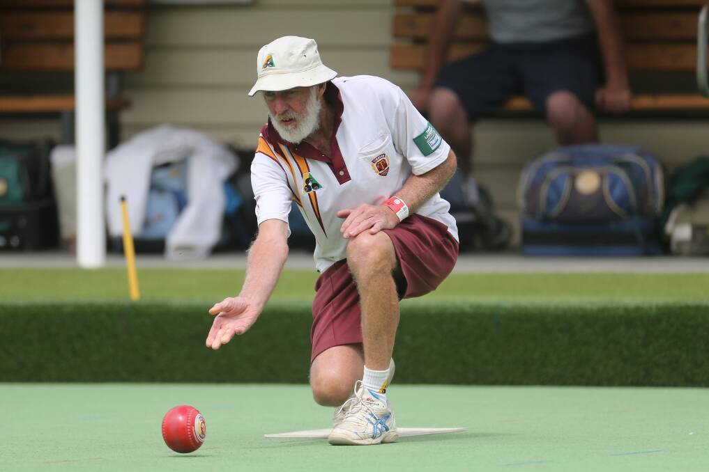 Rolling along: Timboon Gold's skipper Mick Gaut rolls his bowl down the green. Picture: Mark Witte