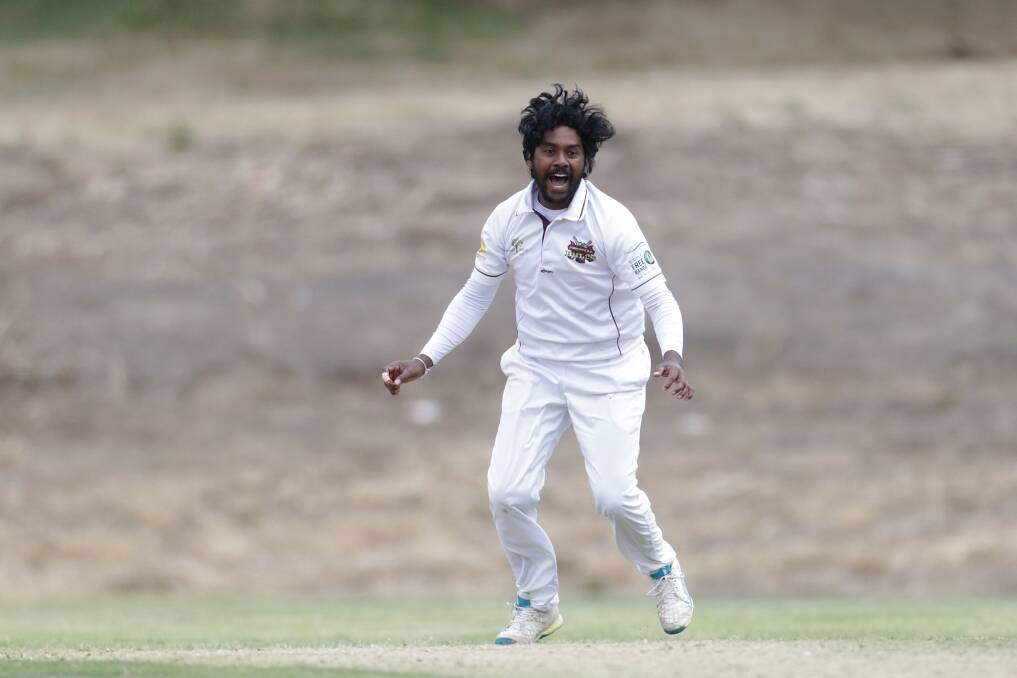 SMILE IF YOU'RE HAPPY: Pomborneit's Lahiru Fernando celebrates a wicket in the division one grand final. Picture: Mark Witte