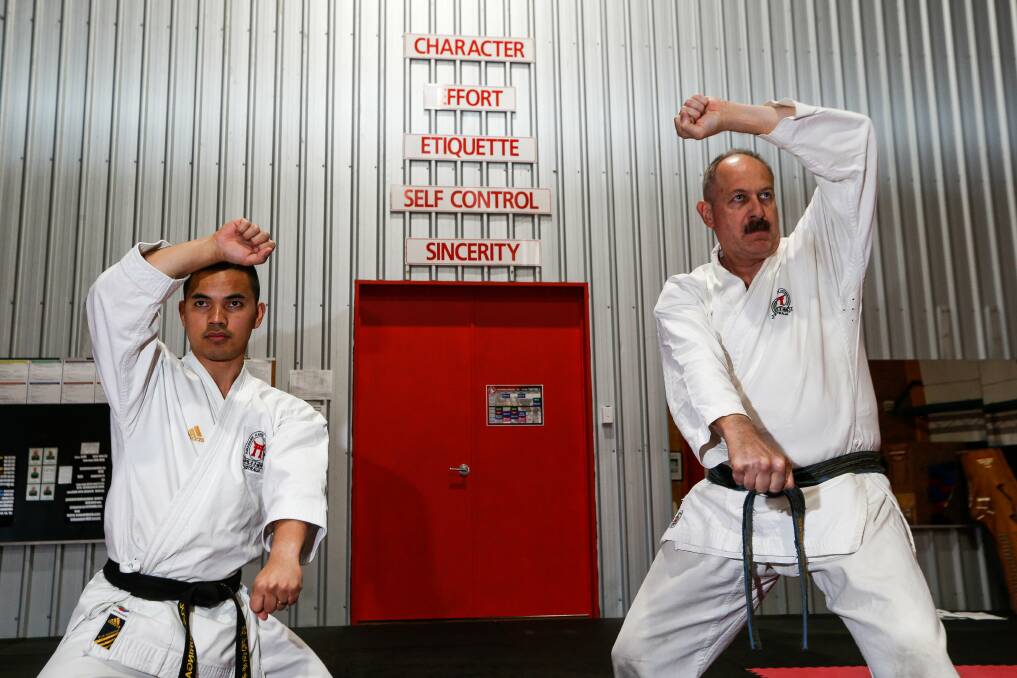 Karate and fitness instructor Josh Suringa and chief instructor FKIA Frank Mckenzie look forward to welcoming more karate students back. Picture: Anthony Brady