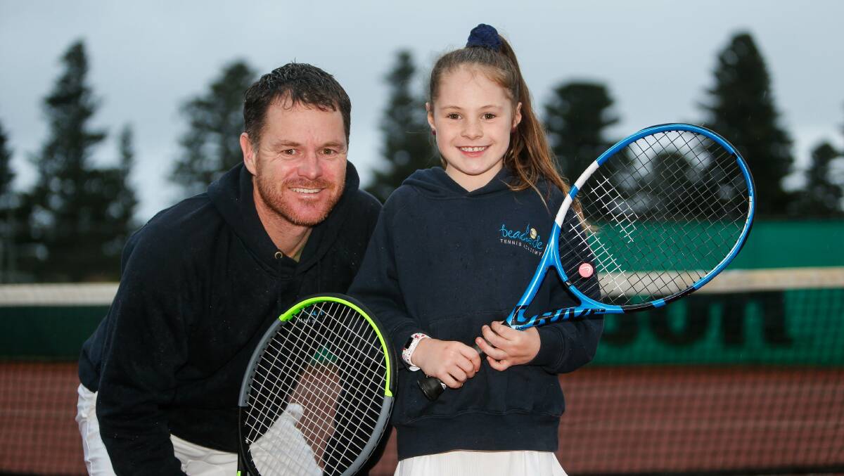 Tennis is back: Andrew and Lilly Crawford from Beachside Tennis Academy. Picture: Anthony Brady