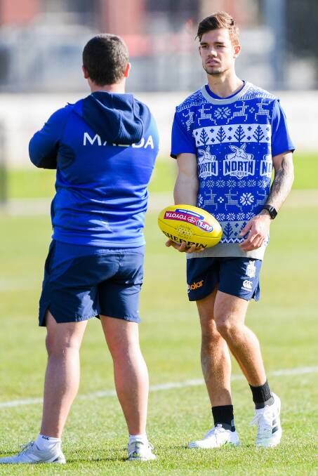 Jy Simpkin of North Melbourne trains during an open training session. Picture: Morgan Hancock