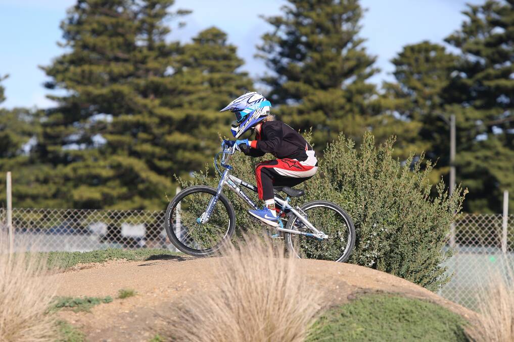 PEDAL POWER: Leo Pearson goes over one of the mounds at the Warrnambool BMX track at Jetty Flat during a practice run on Saturday. Picture: Mark Witte