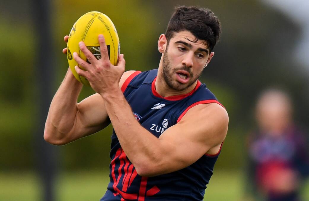 BENCH SELECTION: Melbourne midfielder Christian Petracca trains at Gosch's Paddock earlier this year. Picture: Morgan Hancock