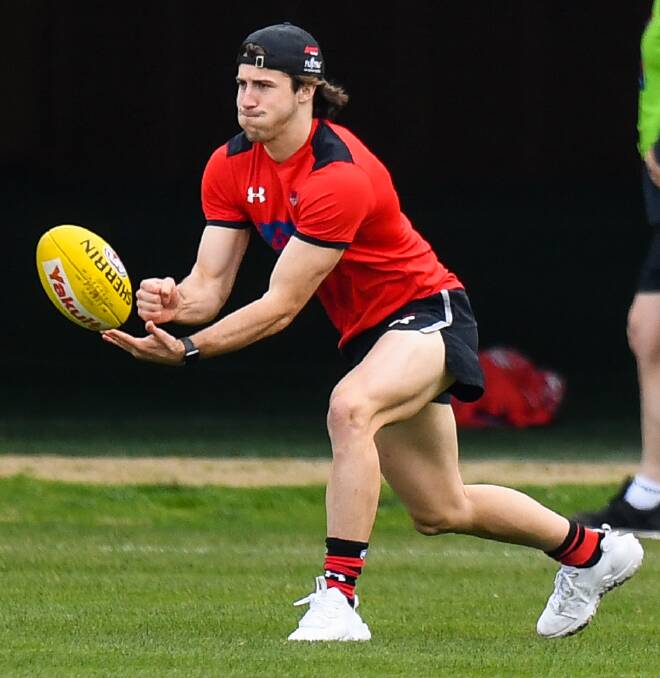BALL WINNER: Andrew McGrath is spending more time in the Essendon midfield and it's paying dividends. Picture: Morgan Hancock