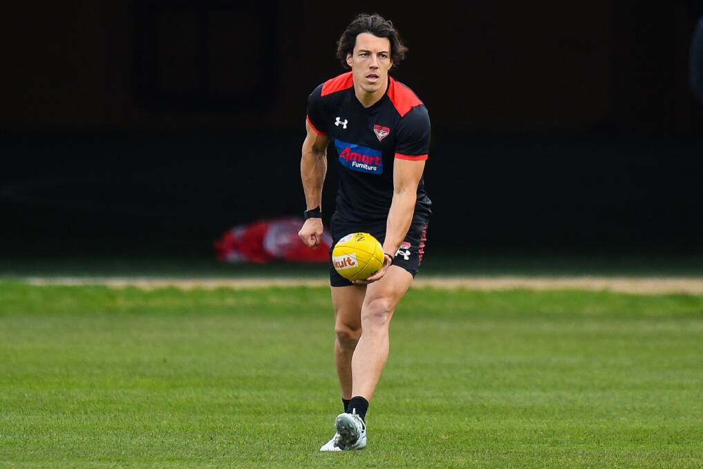 INTERRUPTED: Essendon, including Dylan Shiel, had a game postponed because of COVID-19. Picture: Morgan Hancock