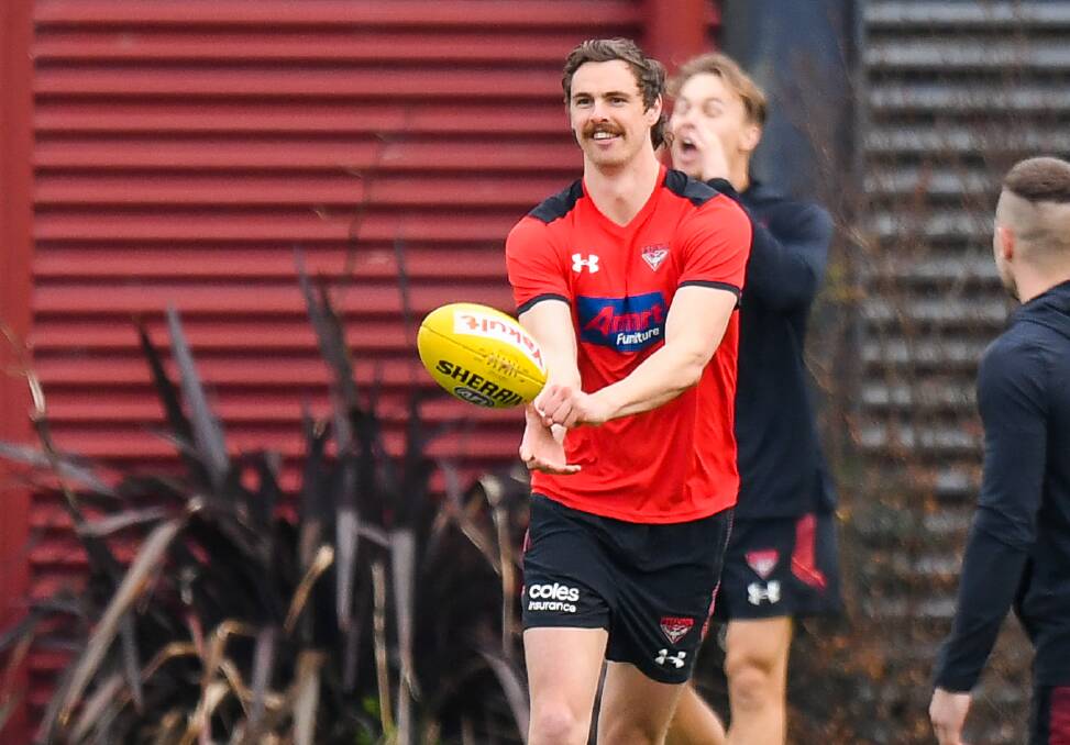 Joe Daniher of the Bombers trains during an open training session. Picture: Morgan Hancock