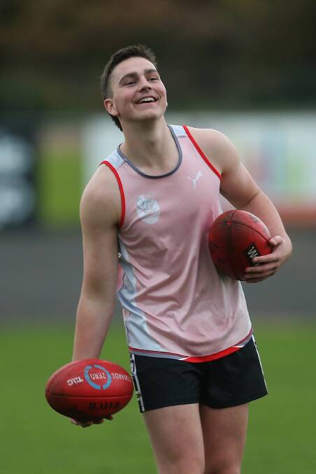ALL SMILES: South Warrnambool's Matt Bradley has fun during a drill at under 18 training on Wednesday night. Picture: Mark Witte