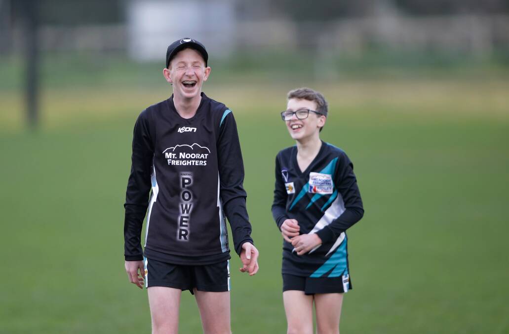 HAPPY DAYS: Kolora-Noorat's Fred Beasley and Max Kavanagh have a laugh during training earlier this month. Picture: Mark Witte