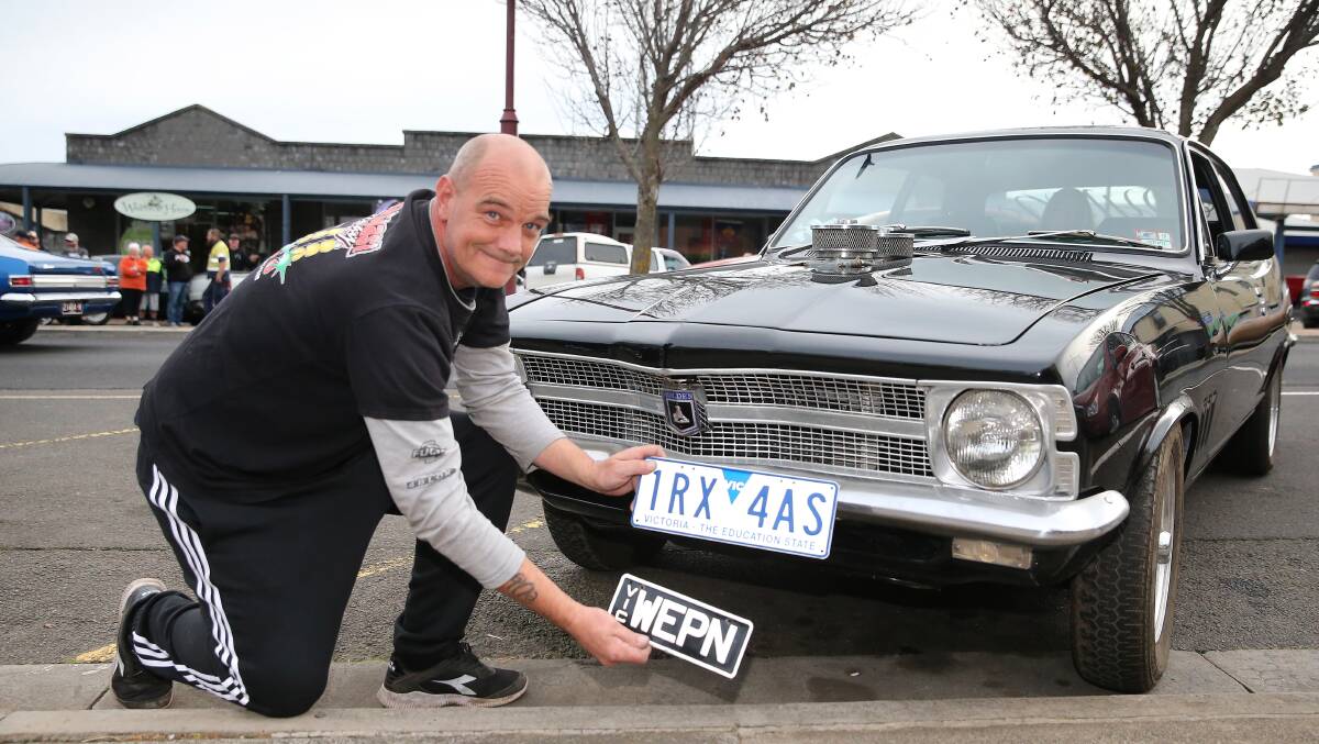 Peter Hansen with his WEPN plates and the new Vicroads plates.Picture: Mark Witte