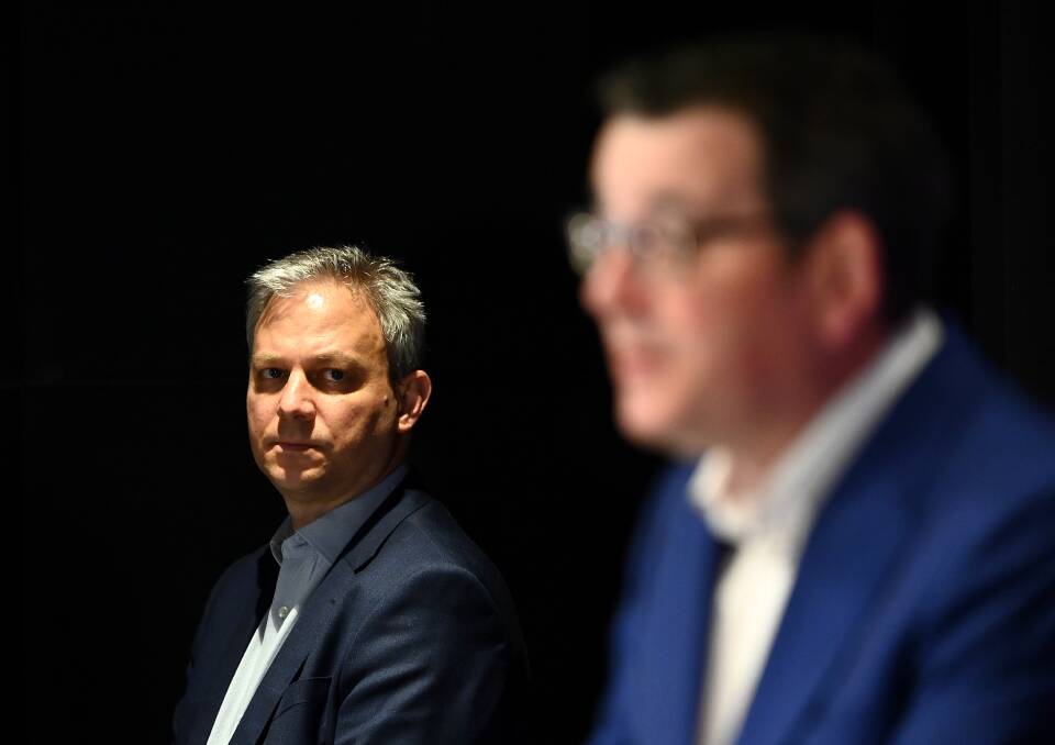 Victoria's Chief Health Officer Professor Brett Sutton looks on as Premier Daniel Andrews speaks to the media on July 14. (Photo by Quinn Rooney/Getty Images)