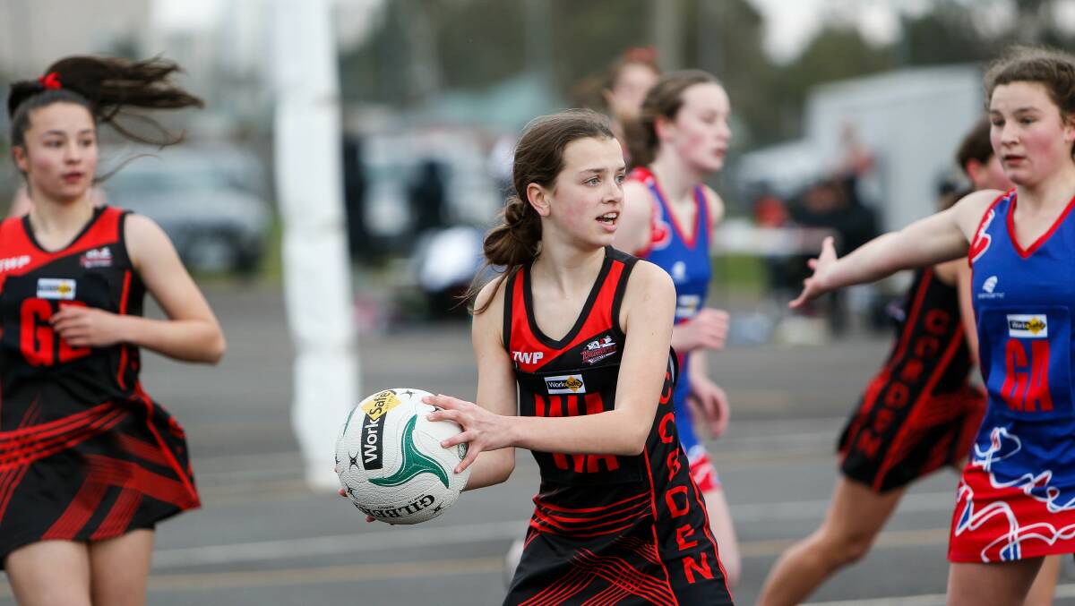 Searching for teammates: Cobden's Kate Smith during the Terang Mortlake versus Cobden under 15s netball game at Cobden. Picture: Anthony Brady