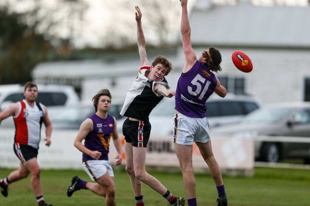 First and last game?: Koroit's Tom Baulch and Port Fairy's Jarv Wiedermann during the Koroit versus Port Fairy under 18.5s football game at Victoria Park on Sunday. Picture: Anthony Brady