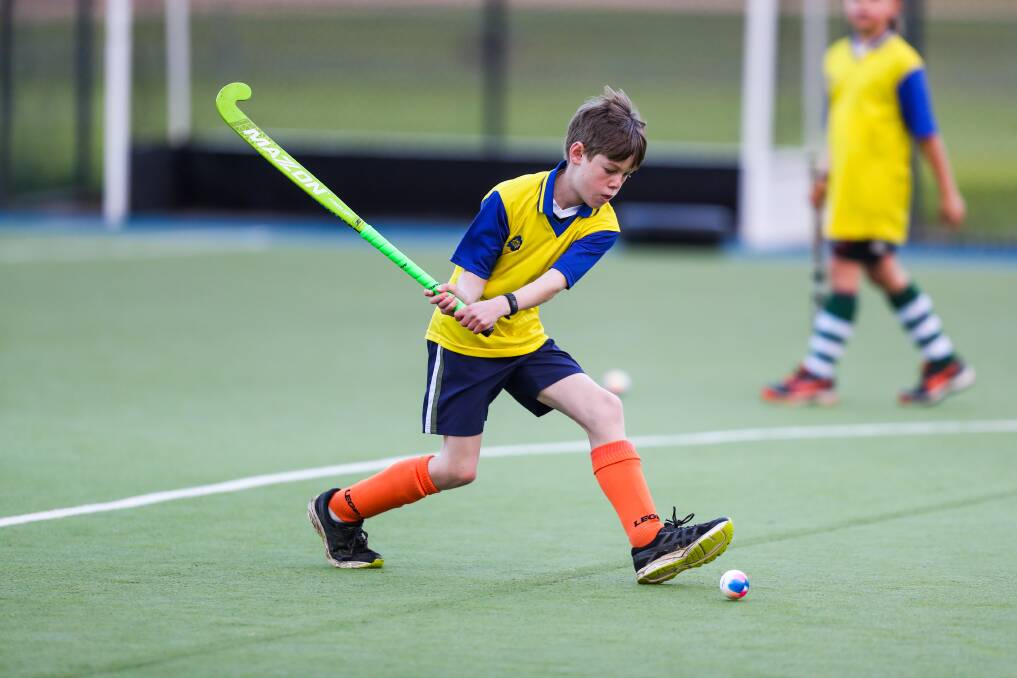 KEEPING BUSY: Michael Lougheed playing under 12 hockey in Warrnambool on Wednesday. He also umpires football, enjoys parkrun and plays soccer. Picture: Morgan Hancock