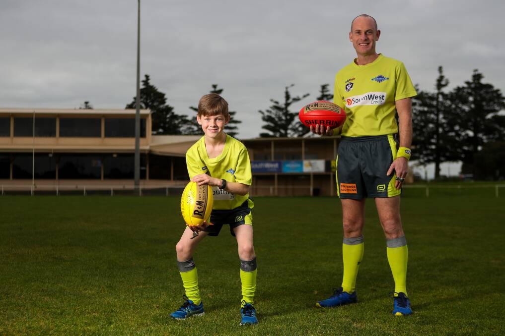 KICKING GOALS: Michael and Andrew Lougheed love umpiring with Warrnambool and District Football Umpires Association. Picture: Morgan Hancock 