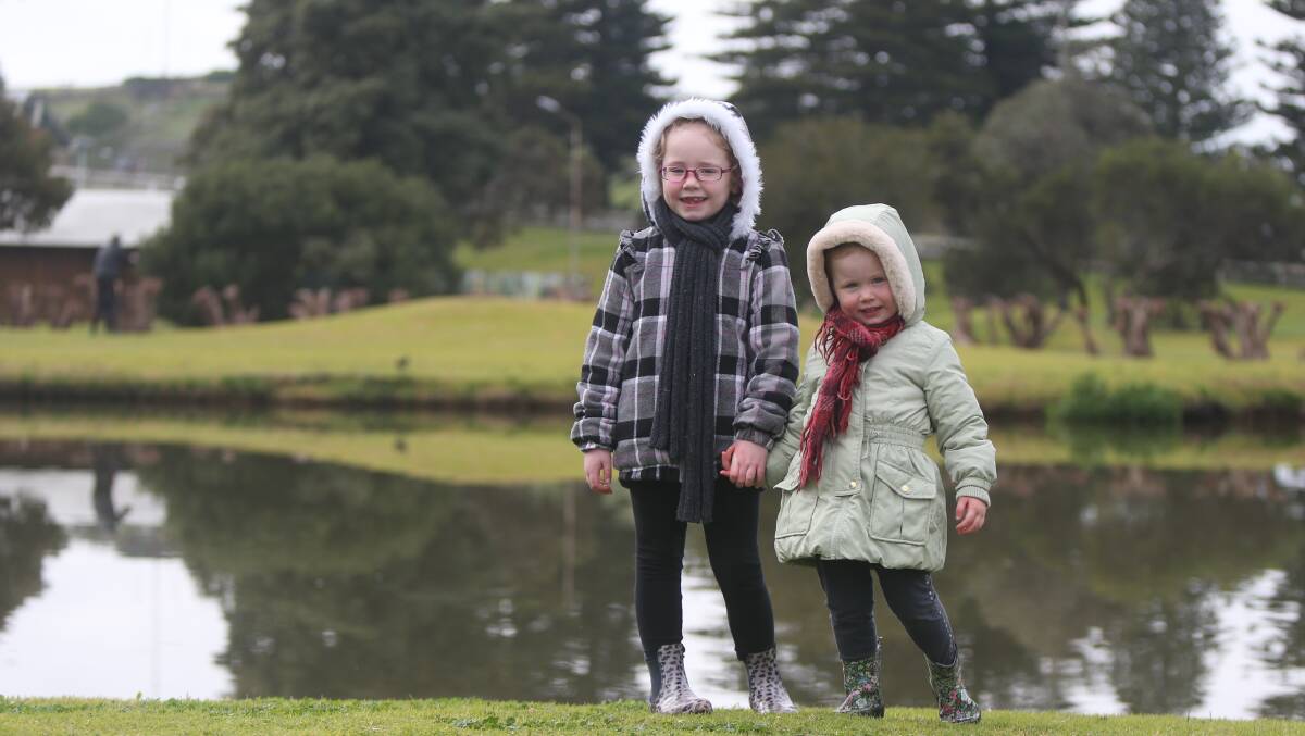 RUGGED UP: Gabriela and Zoe Rhyne kept warm on a visit to Lake Pertobe recently. Picture: Mark Witte