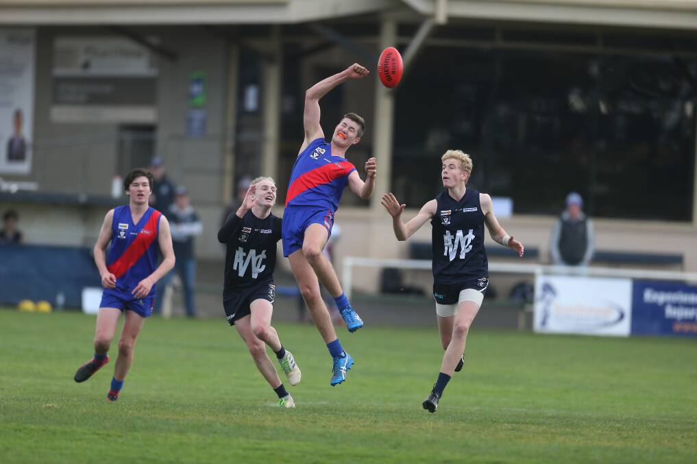 FIELD OF DREAMS: Jock Michael Carter and Jiah Cawthorn compete for the ball during the match between the Warrnambool and Terang Mortlake under 16 match last weekend. Picture: Mark Witte