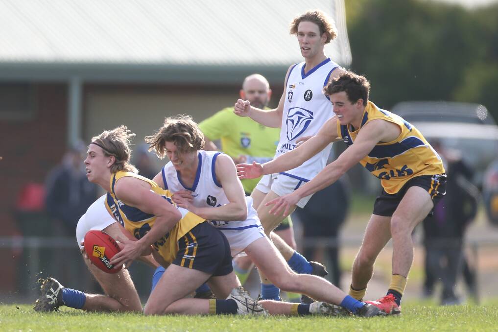 GOTCHA: North Warrnambool Eagles' Jett Bermingham gets tackled by Hamilton Kangaroos' Luke Barnes during a Hampden league under 18.5 match. Picture: Mark Witte