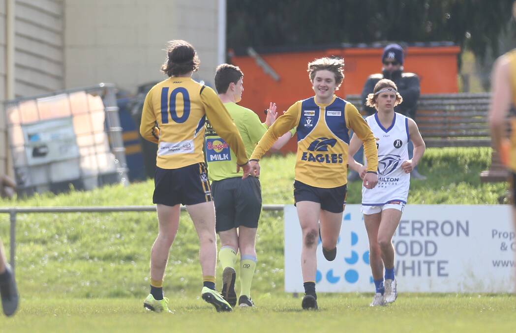 HAPPY DAYS: North Warrnambool Eagles' Bailey Jenkinson and Campbell Love react to kicking a goal during against Hamilton Kangaroos in the under 18.5 competition last week. Picture: Mark Witte