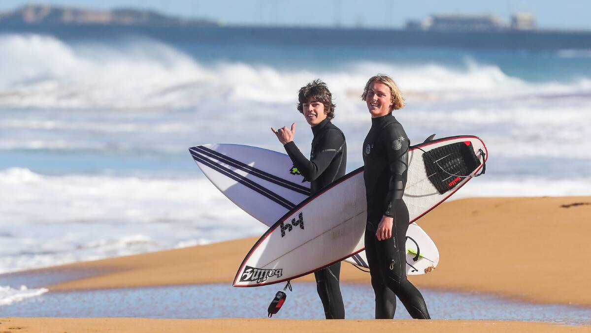 IN THE LINE UP: Daniel Mahony, 17, and Balun Cumming ,16, prepare to surf Logan's Beach. Picture: Morgan Hancock