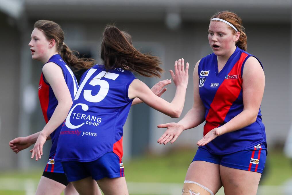 HIGH FIVE: Terang Mortlake's Alice Kain and Taylah Casson celebrate a goal on Sunday. Picture: Morgan Hancock