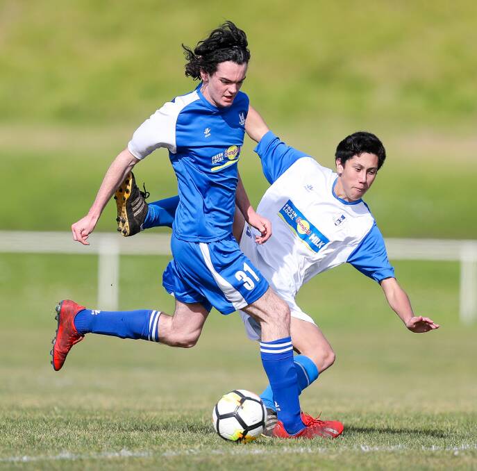 FRIENDLY: Warrnambool played a scratch match on Sunday after their Ballarat and District Soccer Association opponent forfeited. Elijah O'Grady (blue top) and Jordan Whitton (white top) played. Picture: Morgan Hancock 