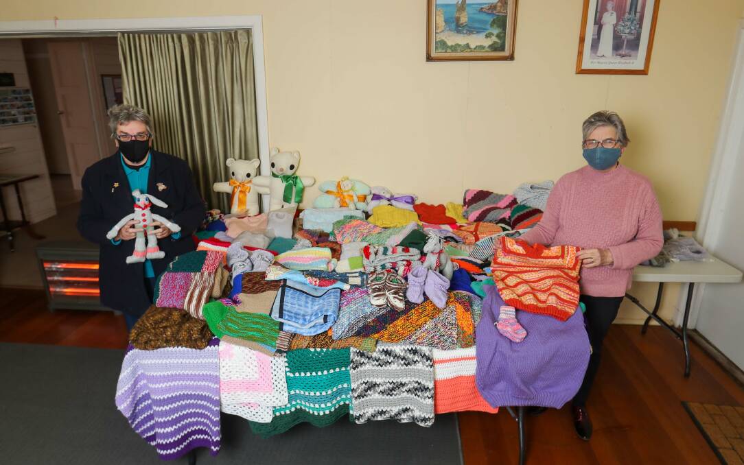 Ready to deliver: South Warrnambool Presbyterian Church president Wendy Allan and secretary Jean Burley with the knitted and sewn items. Picture: Morgan Hancock 
