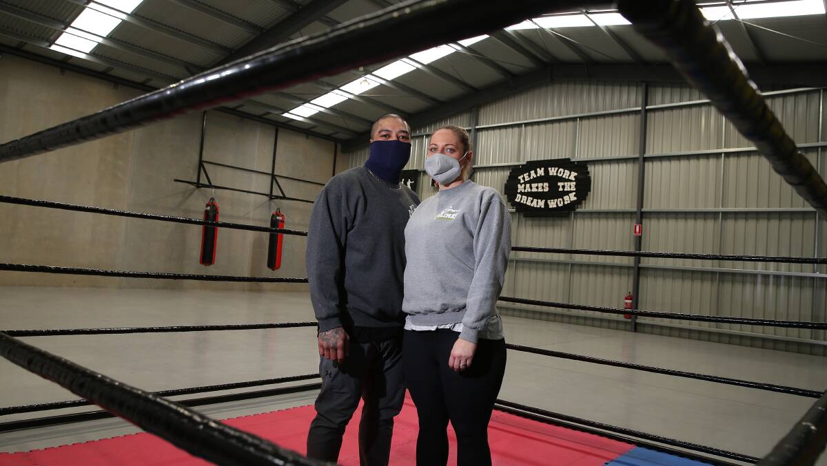 SET UP: Folima's Boxing and Fitness owners Chris and Alison Folima inside their new gym on Jenkins Street. Picture: Mark Witte