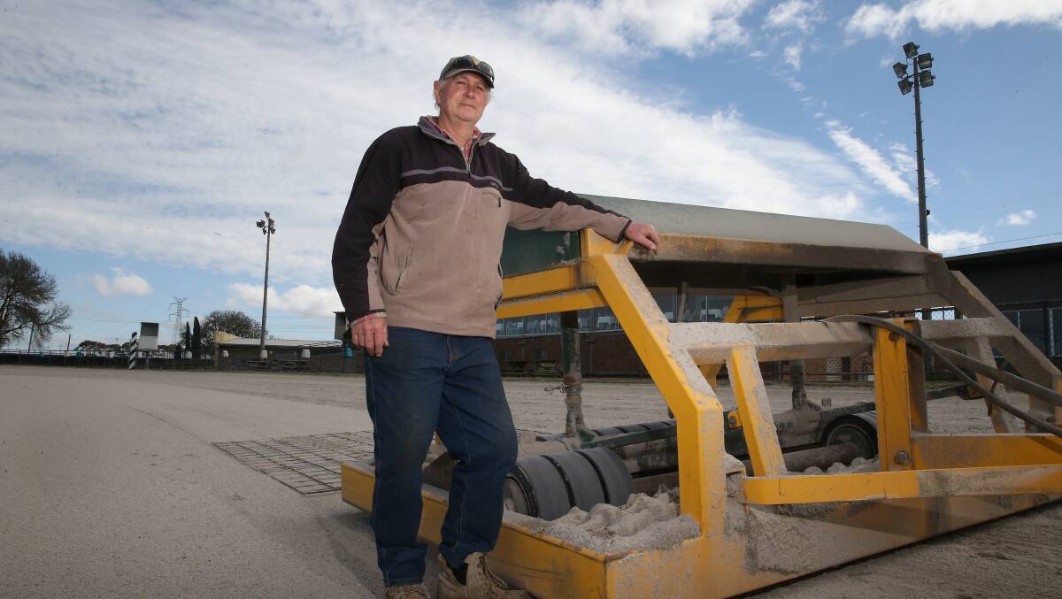 Tools of the trade: Terang Harness Racing Club track curator Allan Driscoll by the conditioner. Picture: Mark Witte