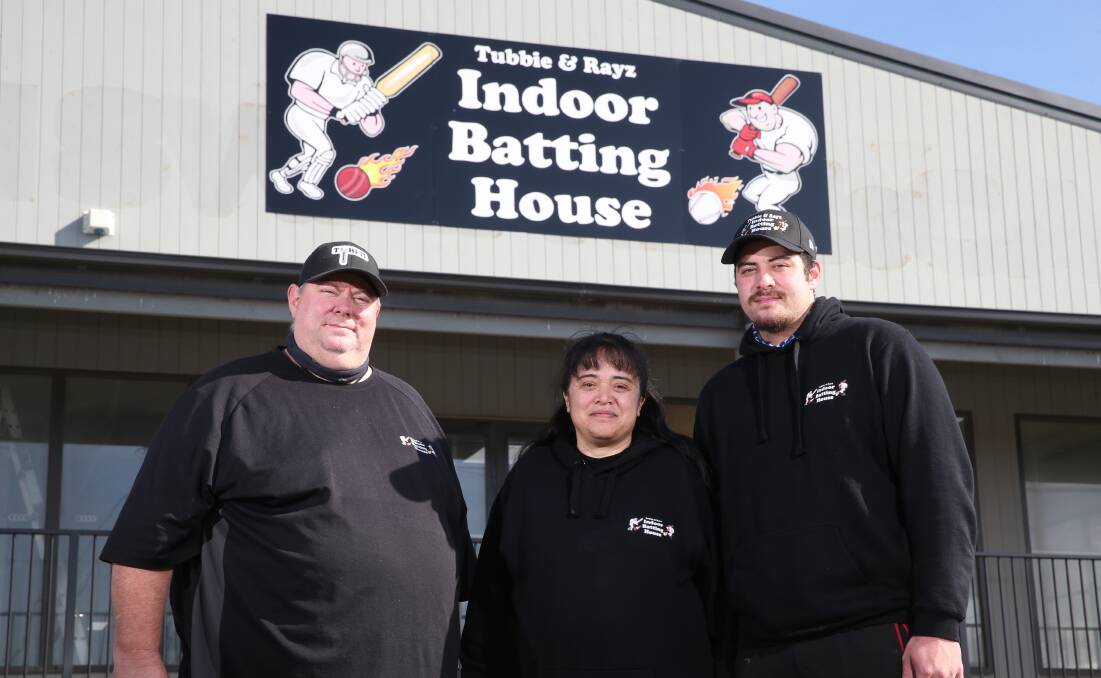 FAMILY BUSINESS: Tubbie and Rayz Indoor Batting centre owner Steve Taylor, his wife Kat and son Anthony outside their new centre. Picture: Mark Witte