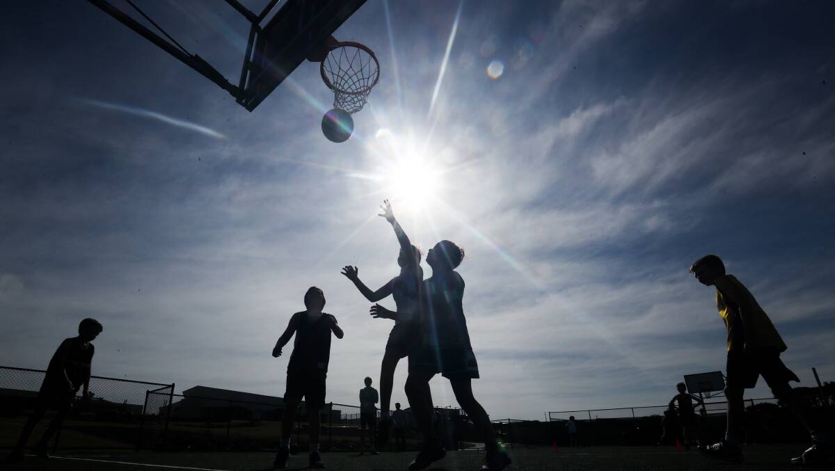 BACK ON COURT: Warrnambool junior basketballers have been training at the outdoor courts at Merri River School. Picture: Morgan Hancock