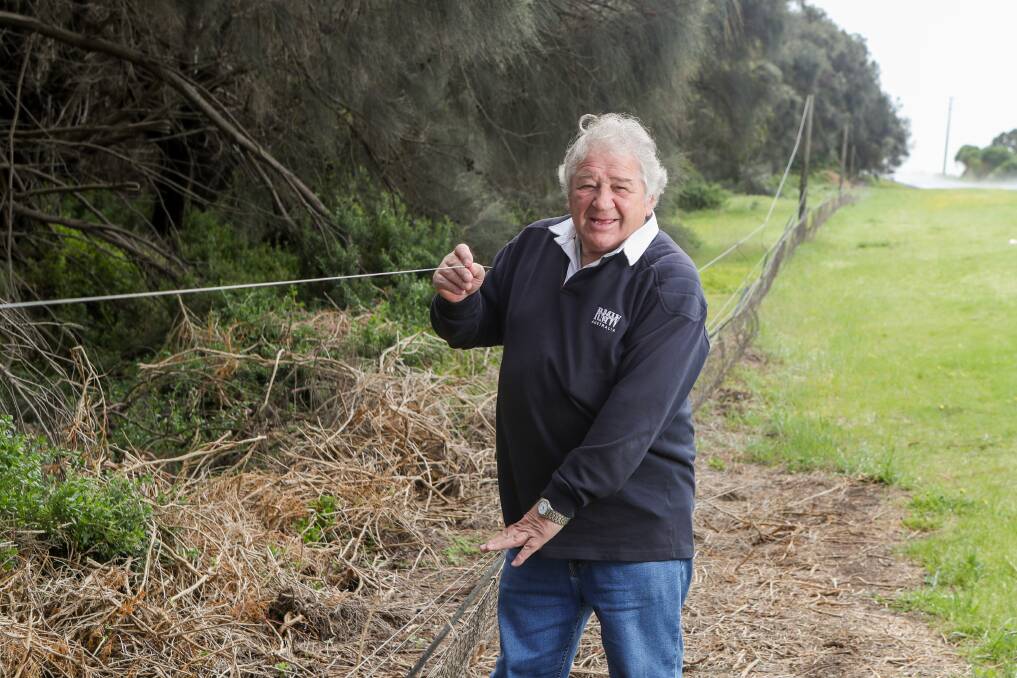 BROKEN: Jim Doukas is unimpressed with the state of the fences at Tower Hill. Picture: Morgan Hancock