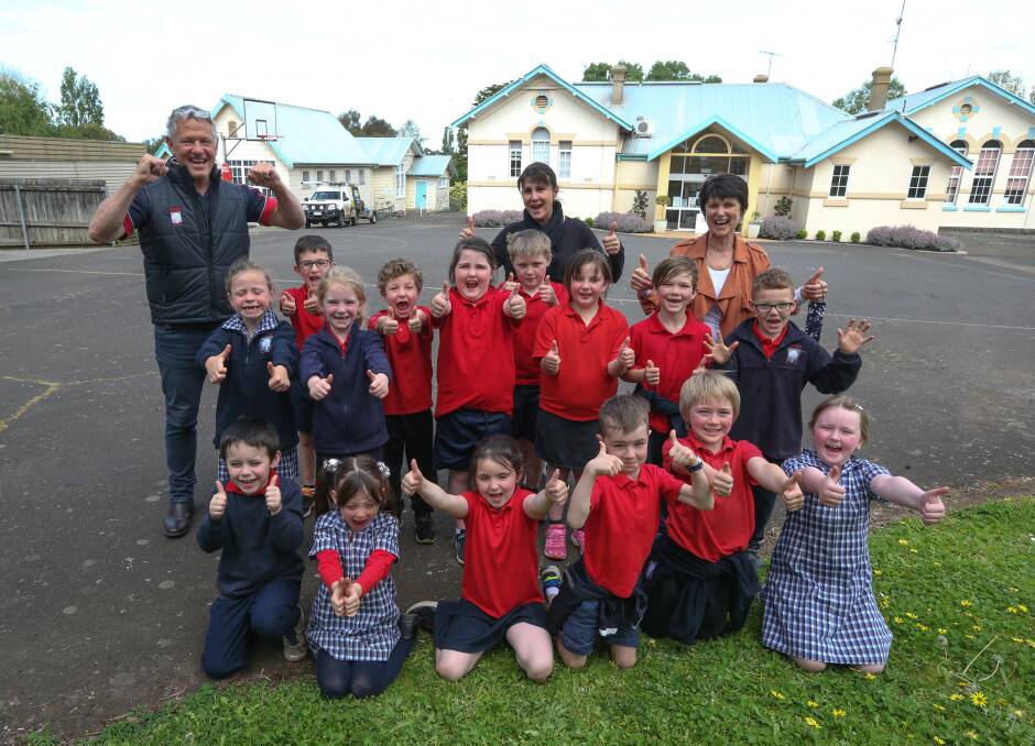 GREAT NEWS: Terang College grade one students celebrate a grant for the school with P-12 assistant principal Michael Castersen, P-6 assistant principal Julie-Ann Kelly and teacher Anne Molan. Pictures: Mark Witte