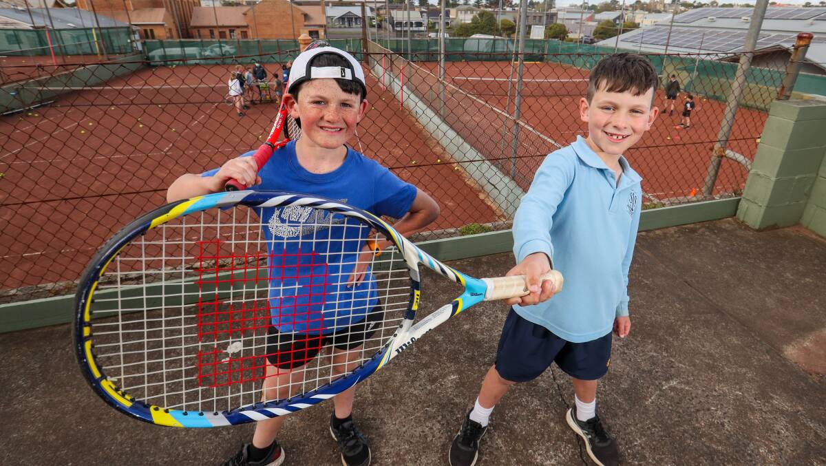 Thrilled: Tighe Perry, 9, and Cooper McCosh, 8, are excited for Warrnambool Indoor Tennis Centre's doors to open. Picture: Morgan Hancock