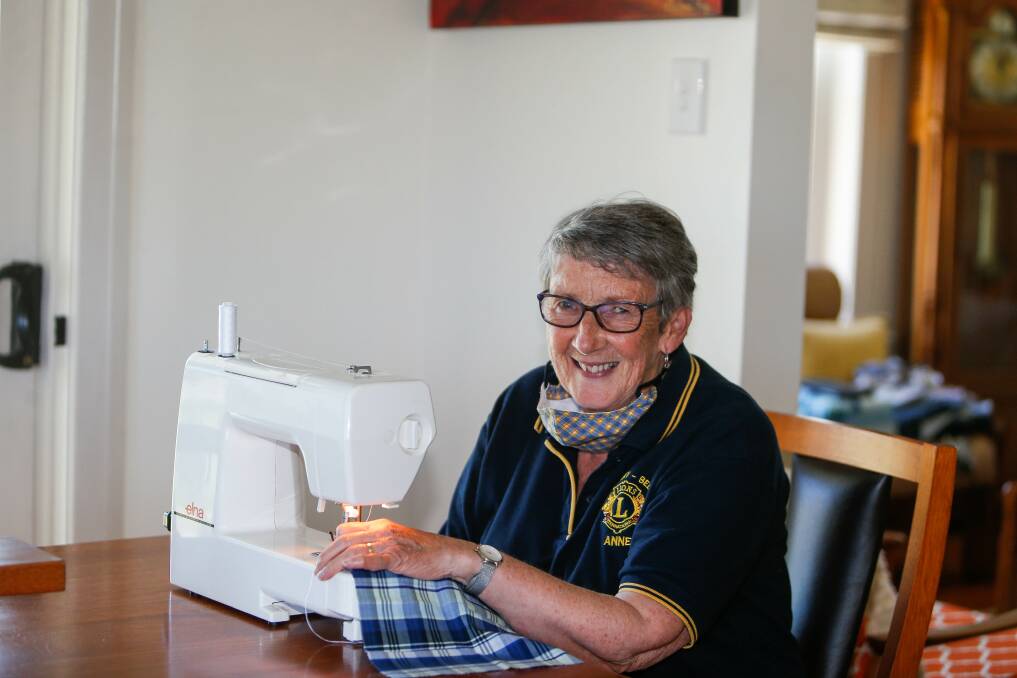 GOOD JOB: Port Fairy Belfast Lions Club member Anne Fry hard at work at her sewing machine, making activity mats. Picture: Anthony Brady