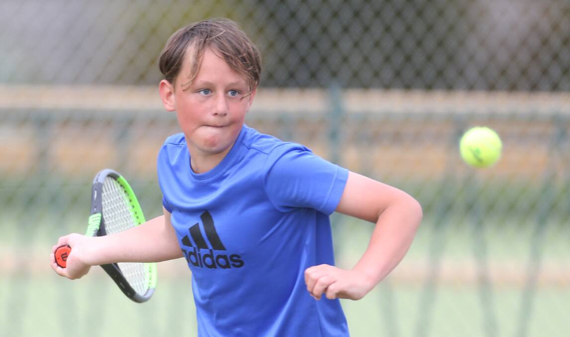 Eyes on it: Koroit's Isaac Brian, 12, during his section one match during Warrnambool Lawn Tennis Club junior pennant this past fortnight. Picture: Mark Witte