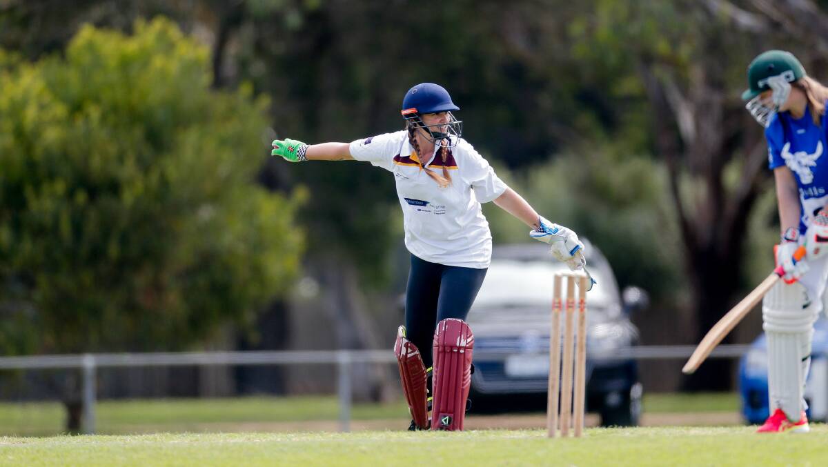 Nestles' Brooke Herbertson returns the ball to the bowler. Picture: Anthony Brady