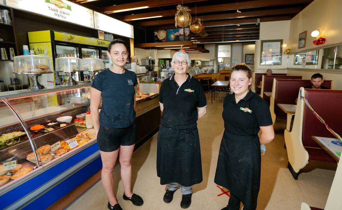 THANK YOU: Mack's Snacks staff Chantelle Saunders, Edith Smith and owner Di Coates (middle) are extremely grateful to locals for their support. Picture: Anthony Brady