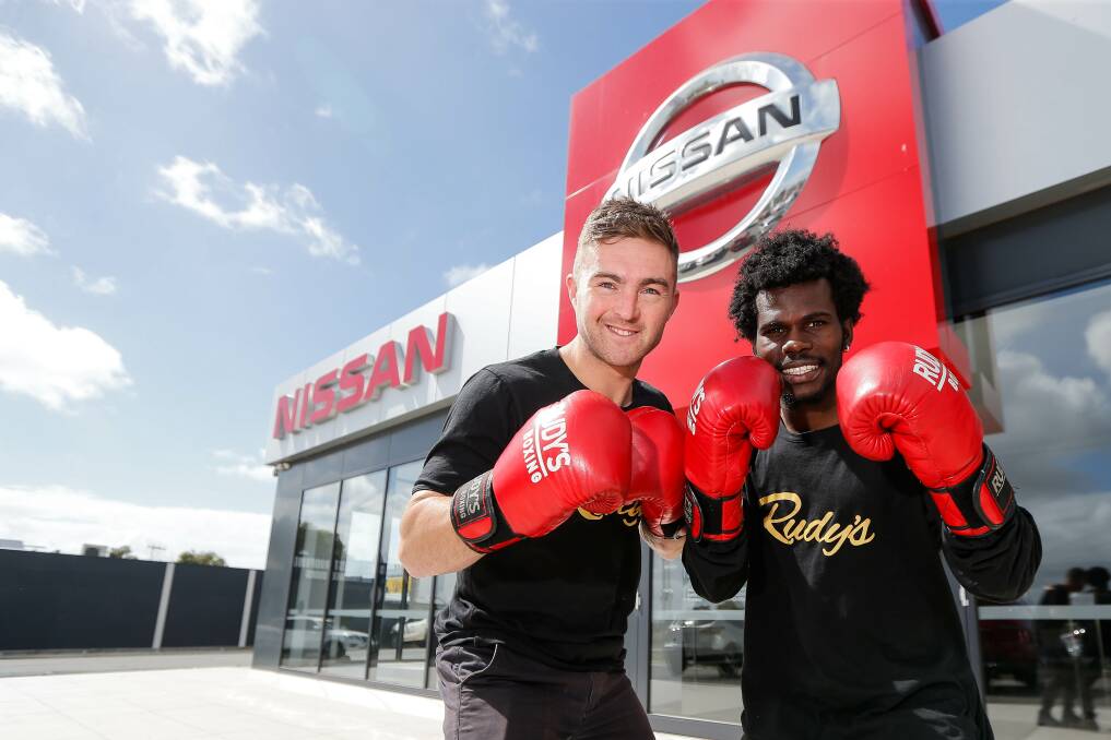 BOX ON: Workmates Ben Turner-Dwyer and Brian Agina will fight on a boxing exhibition card this weekend. Picture: Anthony Brady