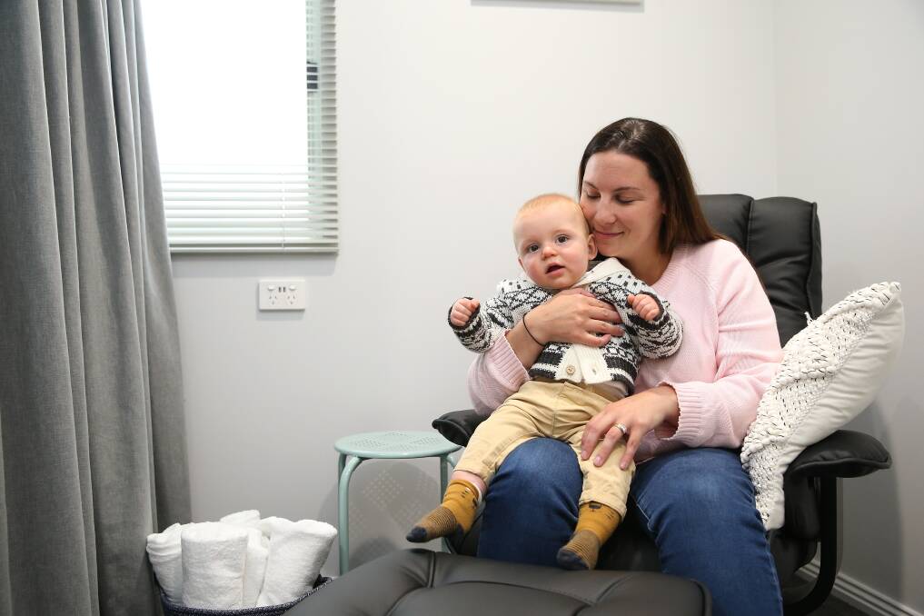 Removing barriers: Bega worker Emma McElgunn with son Fred, 9 months, at the new breastfeeding room at Bega, Koroit. Picture: Mark Witte