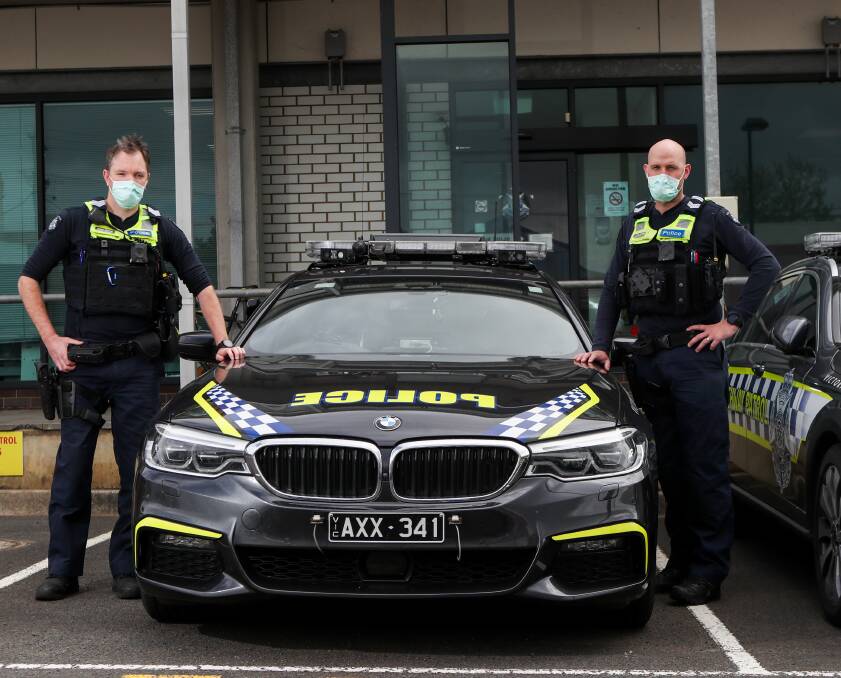 On the lookout: Warrnambool highway patrol Acting Sergeant Jason Barker and Senior Constable Luke Hunter after four drug drivers, three older, were caught on Monday morning. Picture: Morgan Hancock 