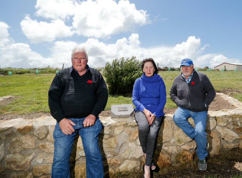 Symbolic: Port Fairy Cemetery Trust members Geoff Youl, Maria Cameron and Malcolm Chamberlain with the sapling from the Lone Pine tree. Picture: Anthony Brady 